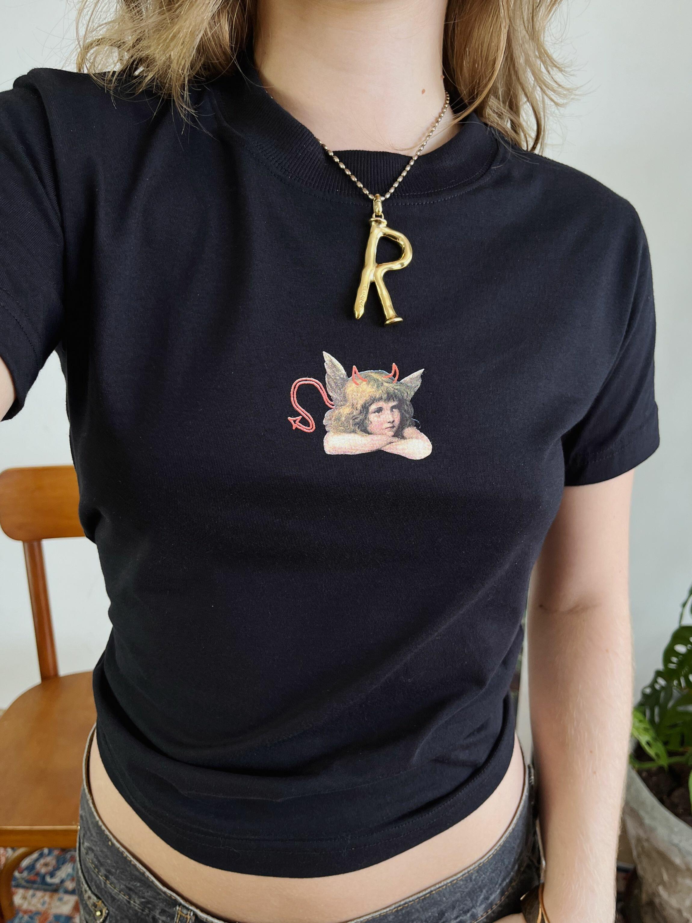 Comprar Baby Tee Angel - R$83,13 - Sometimes Online