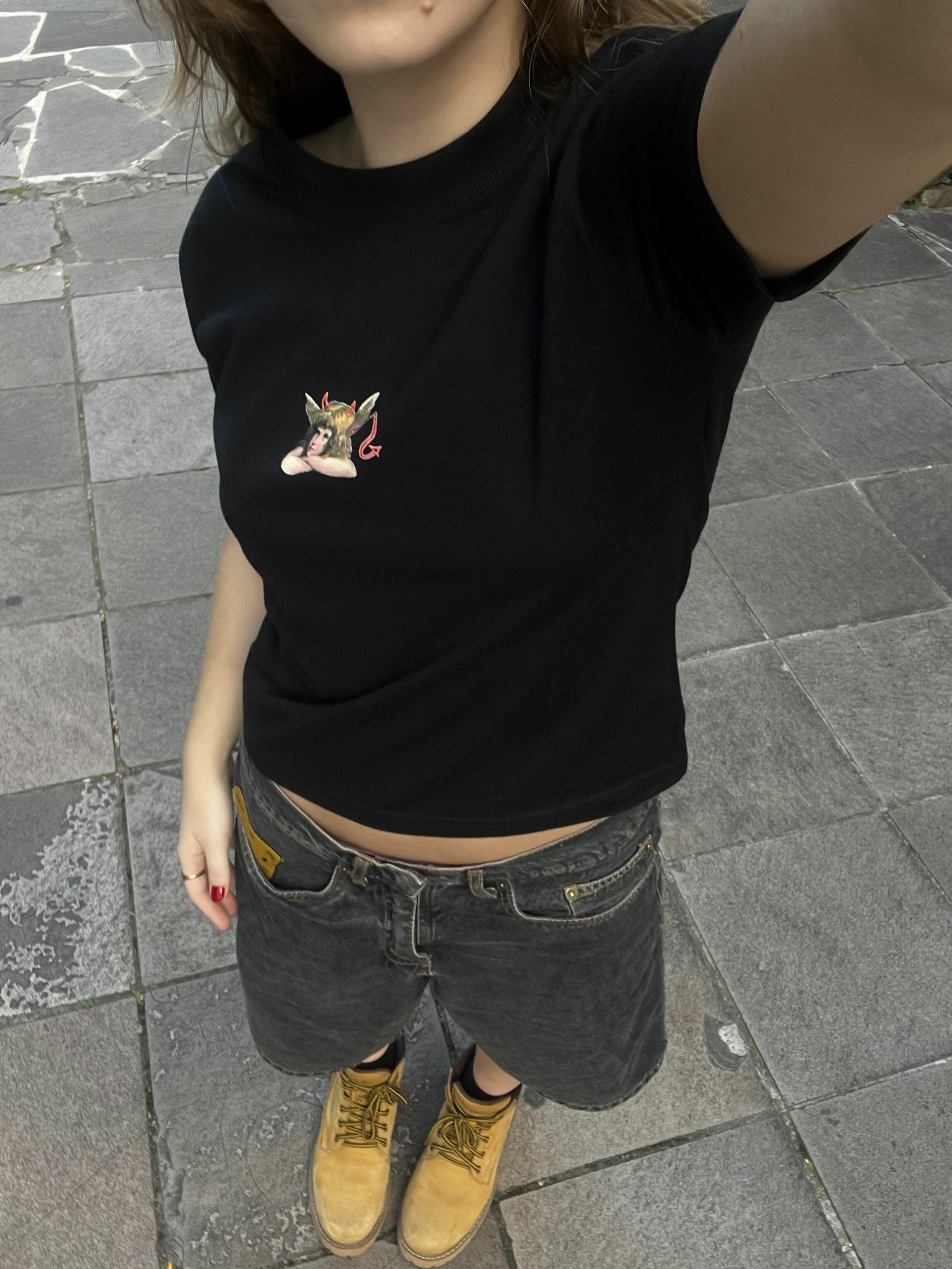 Comprar Baby Tee Angel - R$109,82