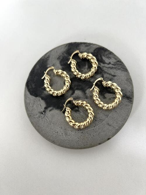 Argola tubo trançada dourado