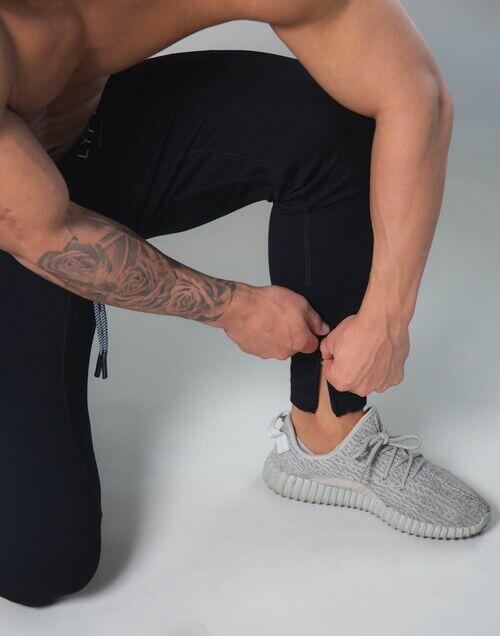 Calça Fitness Jogger Masculina Zíper na Barra
