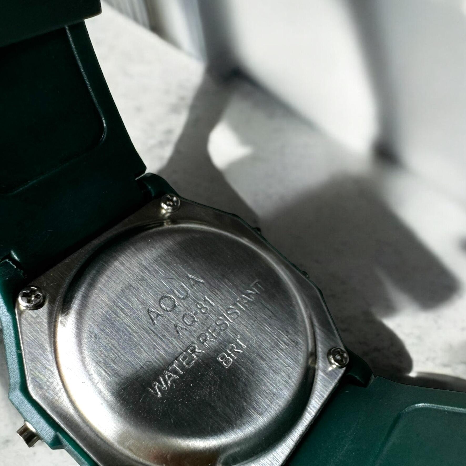 Relógio Feminino Aqua AQ-81 Verde Transparente - A Prova