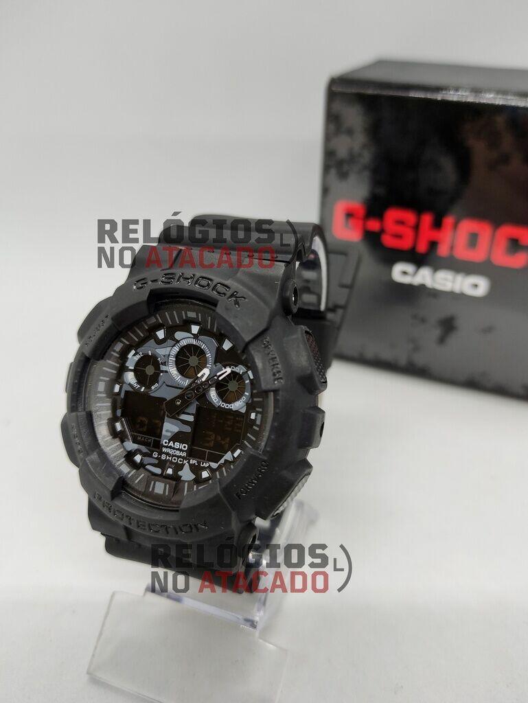 Relógio G-Shock Ga100 Camuflado Preto Fundo Cinza a prova